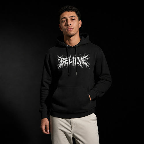 Black organic cotton hoodie with a jagged 'Believe' wordmark printed on the chest