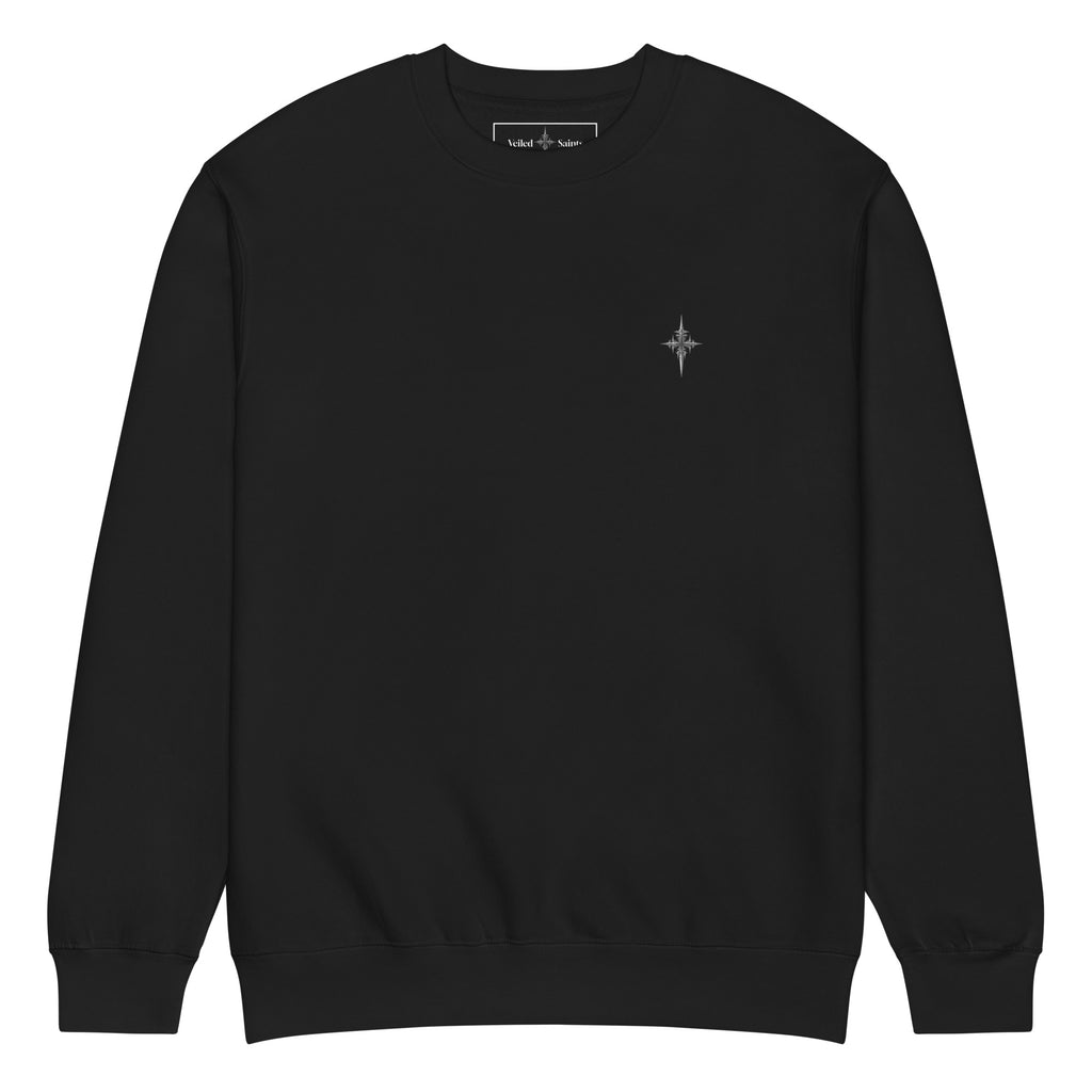 Black crewneck sweatshirt with a small gothic sigil printed on the chest